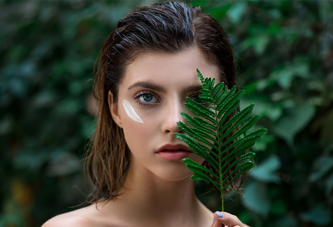 i-Cann Lifestyle model with a leaf covering face as a connotation of natural products with the origins of product range being all natural